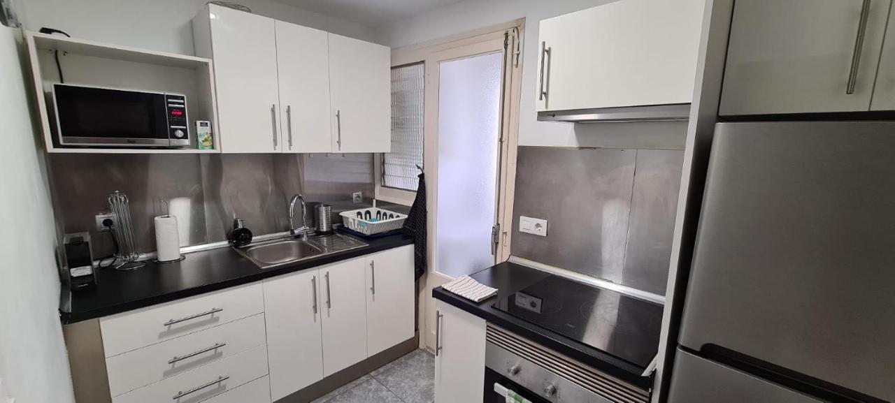 Habitaciones Camp Nou Apartment โอสปิตาเล็ต เดอ โยเบรกัต ภายนอก รูปภาพ
